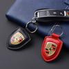 PU-Leder Auto-Schild Schlüsselanhänger Styling Schlüsselanhänger Anhänger für Porsche Cayenne Panamera Macan 911 Taycan Boxster Cayman 918 Pajun