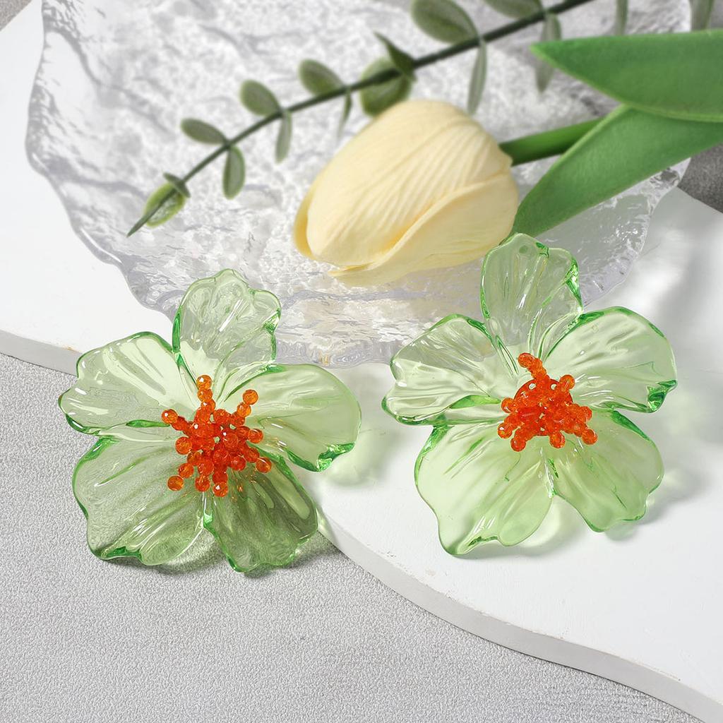 Exaggerated, individualistic, trendy and fashionable acrylic transparent flower stud earrings are versatile and stylish for street style