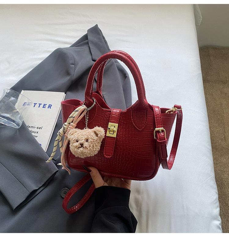

Korean version of simple hand-carried bucket bag 2025 summer new fashionable stone pattern shoulder bag beautiful texture messenger bag червоний