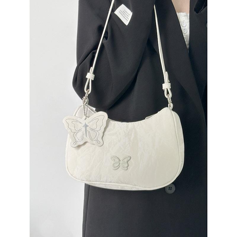 

Premium bow underarm bag women s new niche design casual shoulder messenger bag commuter baguette bag бежевий