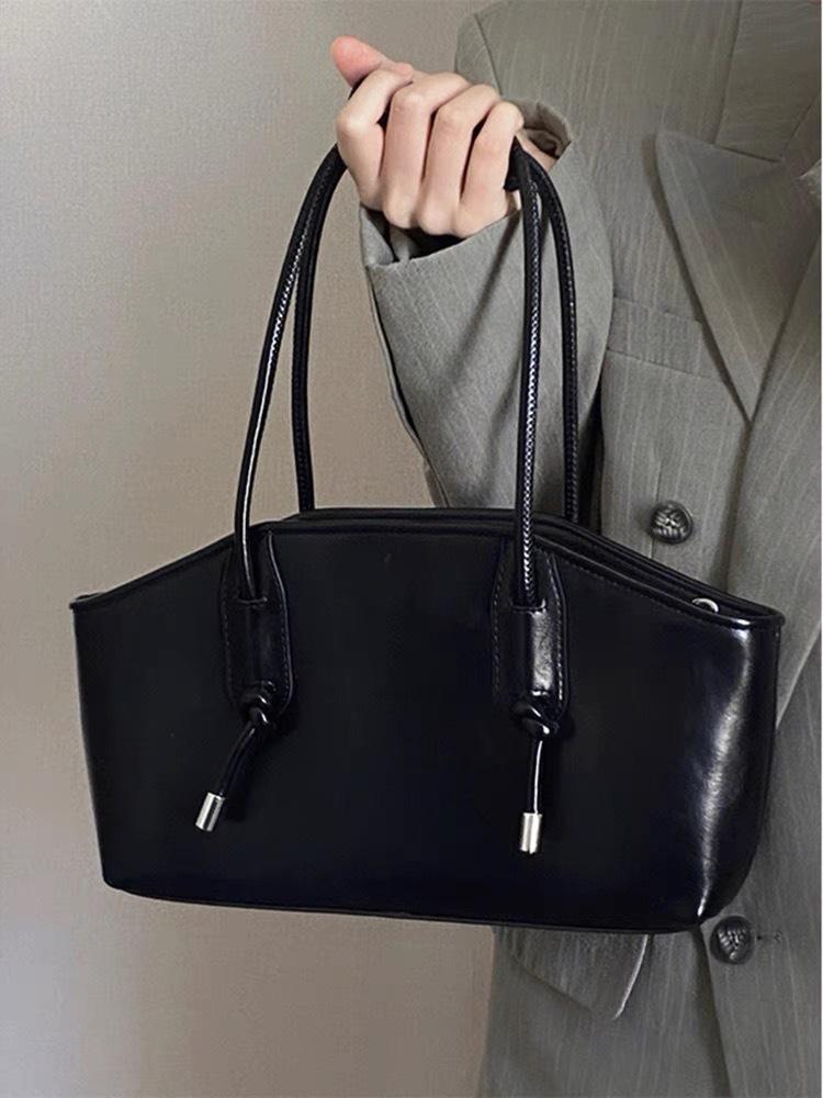 

Women s new bags are popular this year, super hot armpit bags, high-end sense niche fashion commuter shoulder bags. чорний