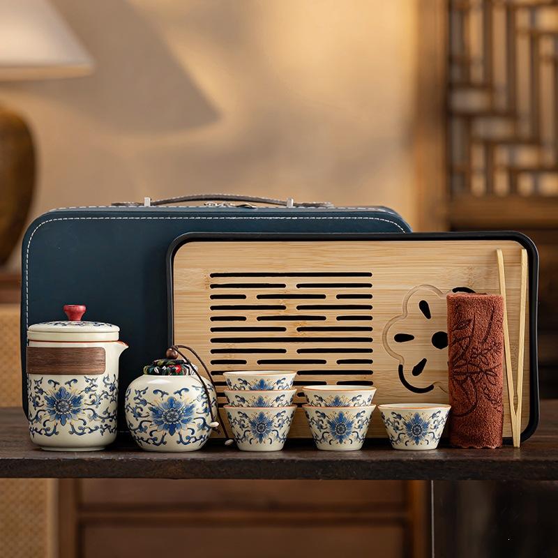 High-end new Chinese retro tea set Ru kiln twisted branch lotus ancient rhyme light luxury portable leather bag gift box enterprise printing