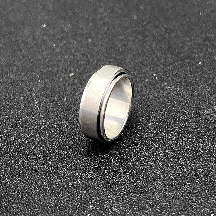 Rotatable Stainless Steel Decompression Ring with Engraved Pattern - Fashionable, Simple Jewelry.