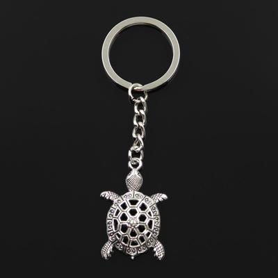 Moda 30mm breloczek metalowy breloczek brelok biżuteria antyczny brąz kolor srebrny Hollow żółw żółw morski 38x25mm wisiorek