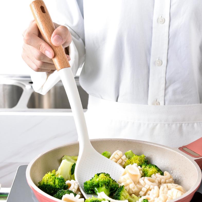 Wooden Handle 8-Piece Silicone Kitchen Utensil Set: Heat Resistant, Non-Stick Silicone Ladle, Spatula, Slotted Spoon with Storage Bucket.
