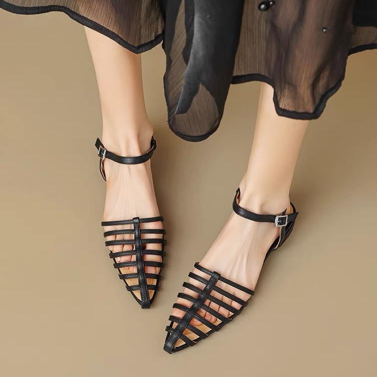 French niche bag head sandals women's summer black high-end flat-soled hollow women's shoes retro pointed Roman single shoes