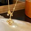 Exquisite Zirconia Flower Pendant Necklace with Round Ring and Sweater Chain - Light Luxury Petal Collarbone Accessory.