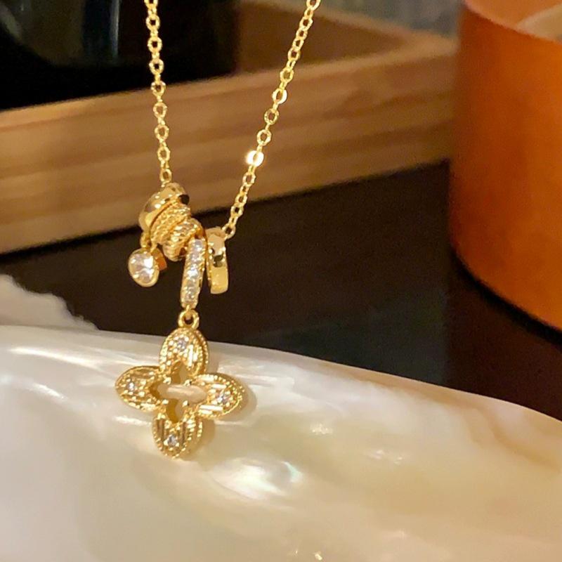 Exquisite Zirconia Flower Pendant Necklace with Round Ring and Sweater Chain - Light Luxury Petal Collarbone Accessory.