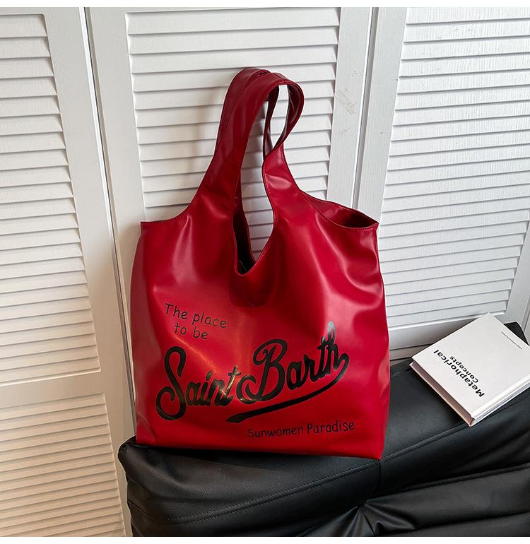 

2025 new large-capacity tote bag women s niche design fashionable and versatile portable shopping bag shoulder bag красный