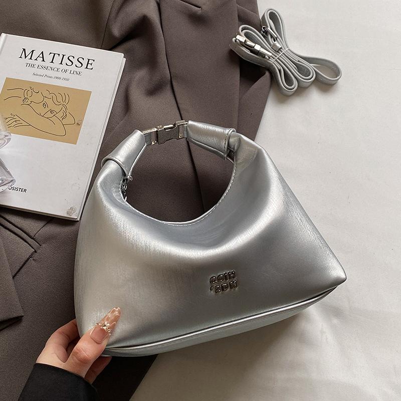 Korean version of fashionable simple high-quality textured wrist dumpling bag niche casual versatile commuter messenger crescent bag women