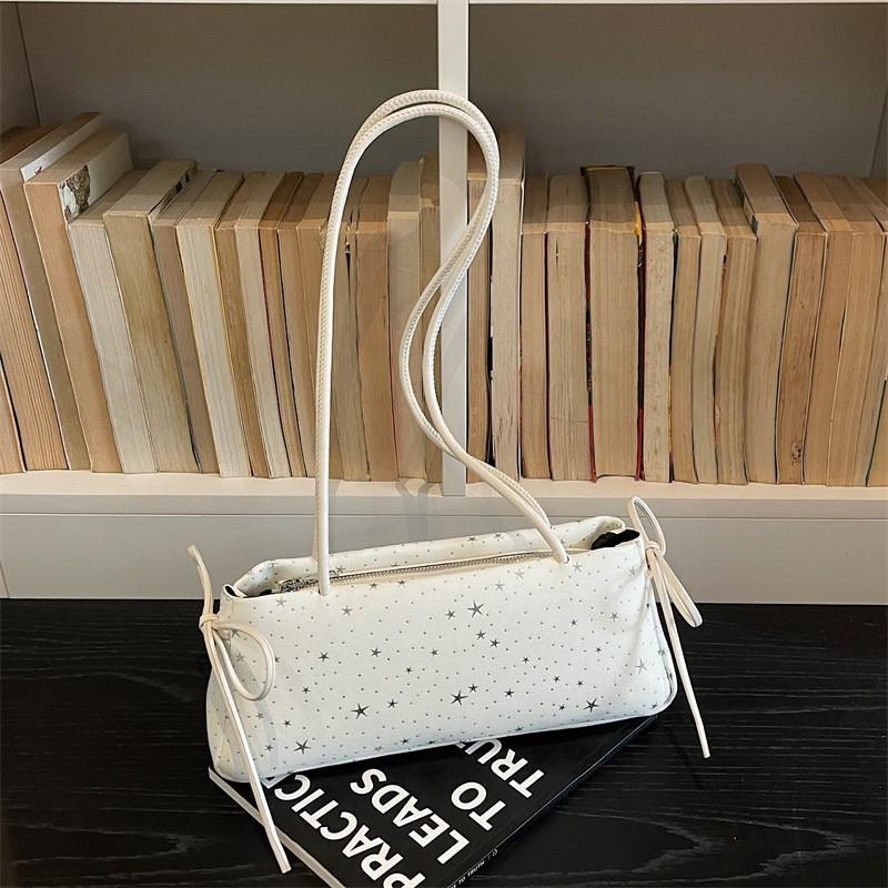 

Korean Ins Internet Celebrity Light Luxury Relaxed Commuting Shoulder Bag High-end Niche Large-capacity French Stick Underarm off білий колір