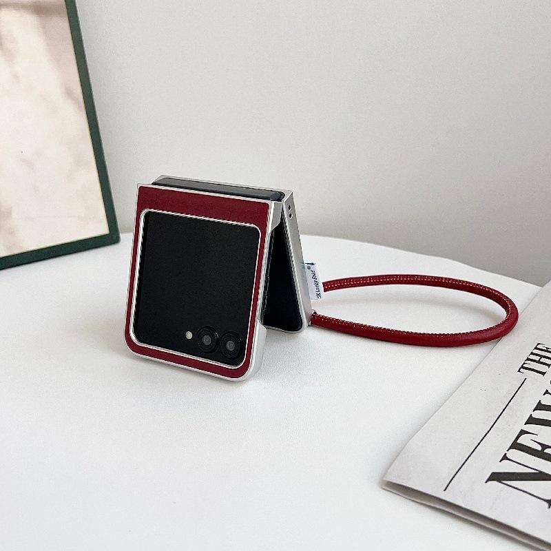 Fashionable Bowknot Motorola Razr60 Drop-proof Foldable Phone Case with Anti-lost Rope.