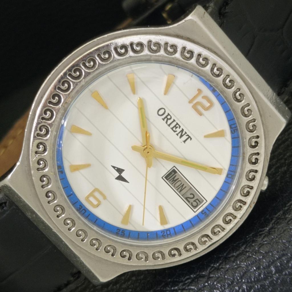 

ВИНТАЖНЫЕ МУЖСКИЕ АВТОМАТИЧЕСКИЕ ЧАСЫ ORIENT ЯПОНИЯ С БЕЛЫМ ЦИФЕРБЛАТОМ a700155-5 R201-a700155