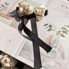 Classic Pearl Bow Tie Brooch With Flower Design For Adults