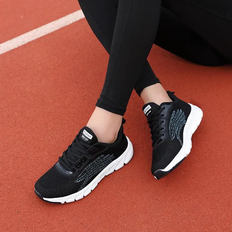 Fashion Spring Flying Knitted Breathable Running Shoes Sports Women Casual Shoes Soft Sole Couples Men And Women Small White Shoes