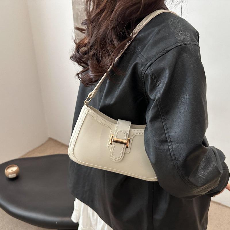 Frühling und Sommer neue vielseitige Temperament Damen einfarbig hochwertige Textur Pendeln Achseltasche Damen Handtrage tragbare Schultertasche