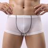 Roupa interior masculina de poliéster sem costura protuberância pênis bolsa calças curtas cintura baixa U ​​convexo