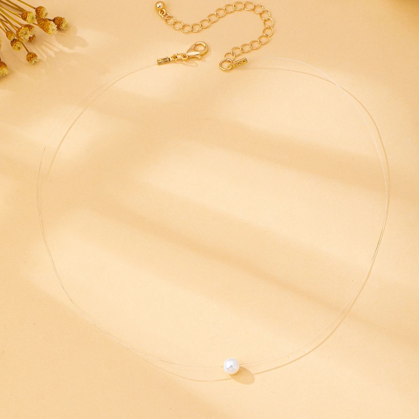 

A Fashionable Women s Necklace, a Transparent Fishing Line Necklace with Imitation Pearls, Suitable for Daily Wear, Vacations, and Gift-Giving,