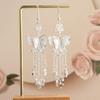 Retro Miao Silver Tassel Earrings: Ethnic Yunnan Long Dangle Women's Jewelry