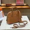 2026 new leather women's bag first layer cowhide method sheep pattern mini shell bag bowling ball portable oblique span women's bag