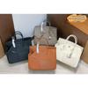 Nuova borsa a mano alla moda, motivo litchi, patchwork irregolare, borsa platino, borsa a spalla messenger, borsa da donna versatile 30CM