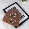 Korean version designer knitted hat children's sweet button face small wool hat autumn and winter bag head warm cold hat