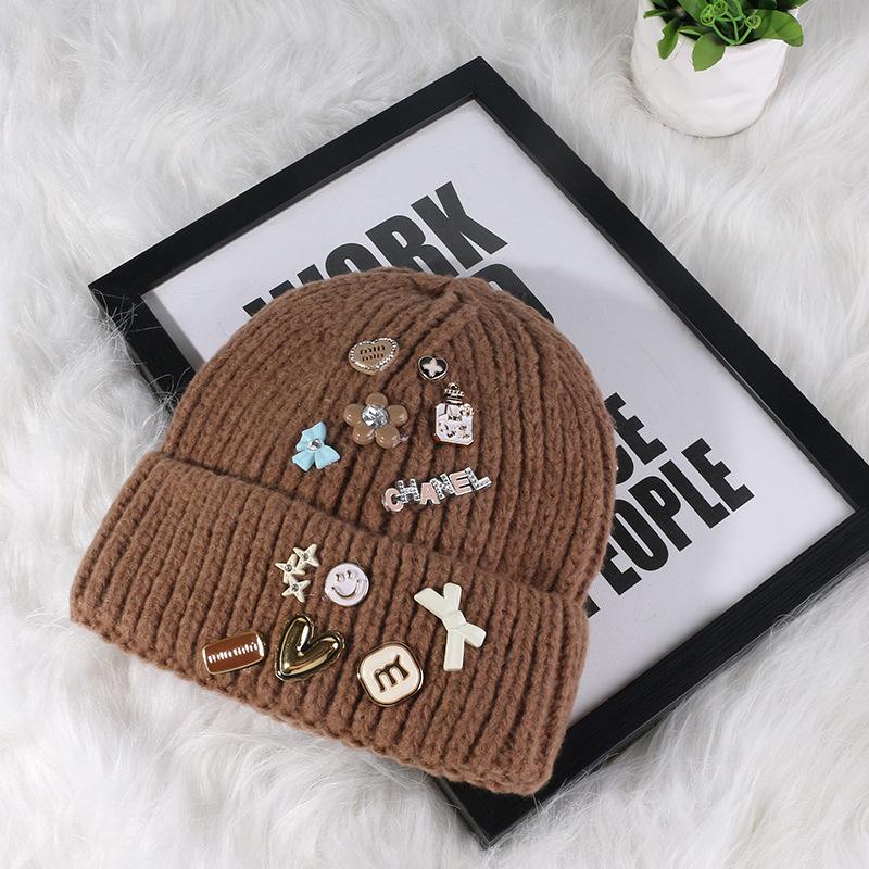 Korean version designer knitted hat children's sweet button face small wool hat autumn and winter bag head warm cold hat