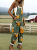 Green jumpsuit with cartoon bee pattern