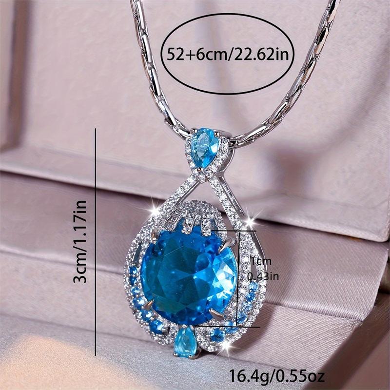 Wysokiej klasy damski naszyjnik, prosty i modny wisiorek w kolorze, błyszczący szlif fajerwerkowy, duży gramowy niebieski cyrkon
