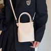 Wholesale simple texture solid color portable bucket bag women's casual versatile light commuter wind messenger mother and child bag