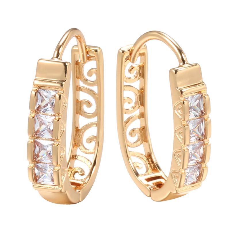 Fashion copper-plated real gold micro-inlaid zircon earrings, ear buckles, temperament hollow engraved earrings.