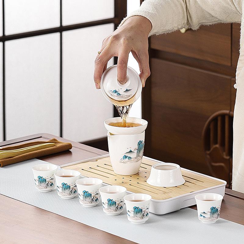 Dehua suet jade white porcelain set kung fu tea set cover bowl travel set company gifts can be added to customers