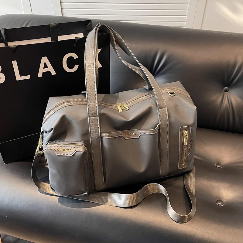 Women's outgoing travel bag Fashion large-capacity portable business trip duffel bag High value lightweight sports fitness bag Men's