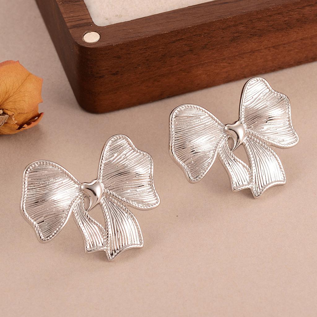 Retro Bow Stud Earrings Design Sense Personality Versatile Smooth Surface High Sense Earrings New Earrings