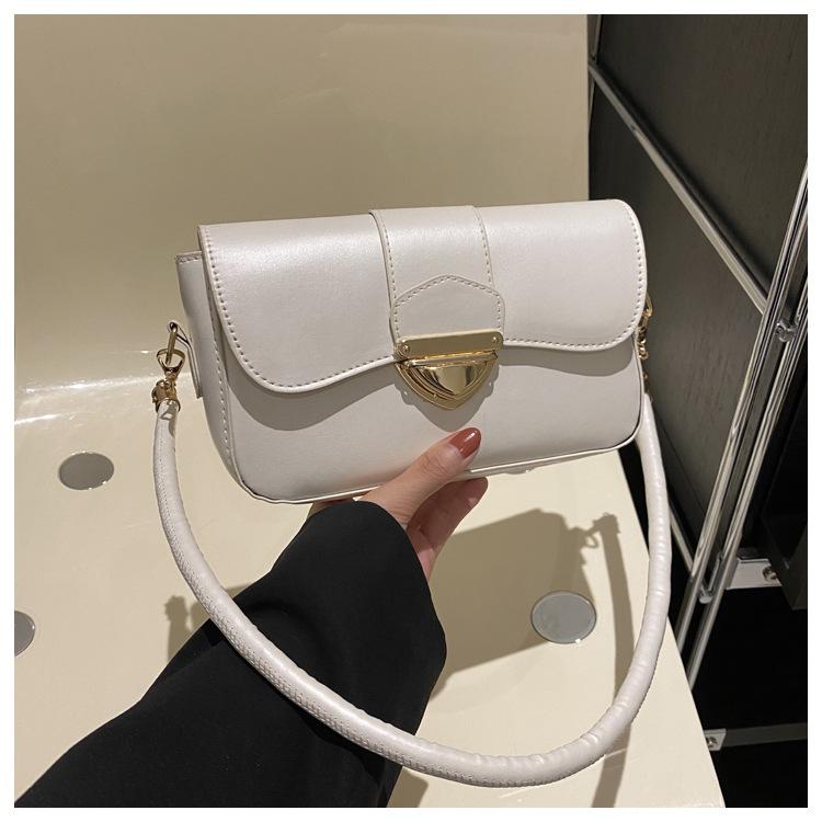 

Высококачественная маленькая женская сумка 2024 года, новая модная сумка-мессенджер в стиле ретро, нишевый дизайн, сумка через плечо подмышкой белый