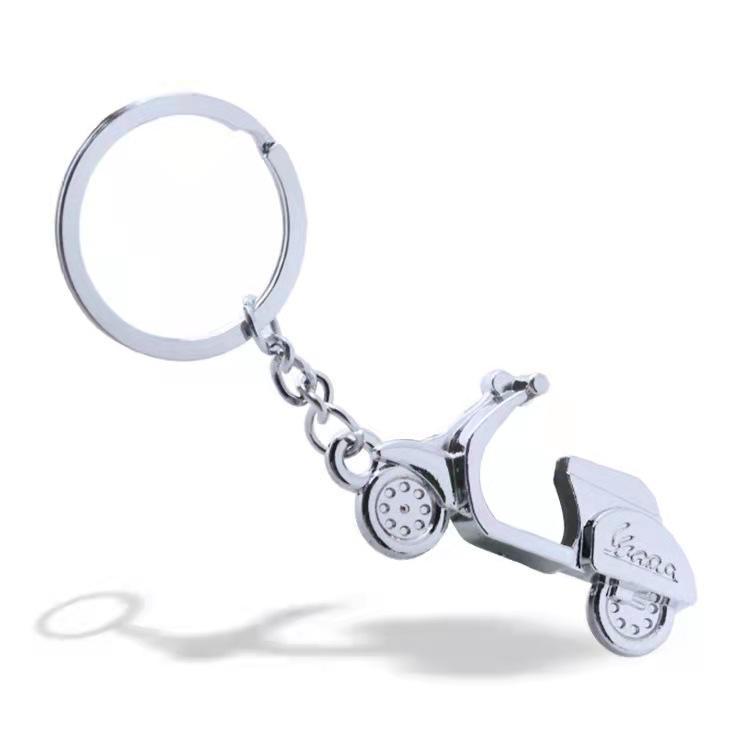 Лазерлік логотипі бар металл мотоцикл салпыншақ - бірегей жарнамалық сыйлық немесе шағын жетон.