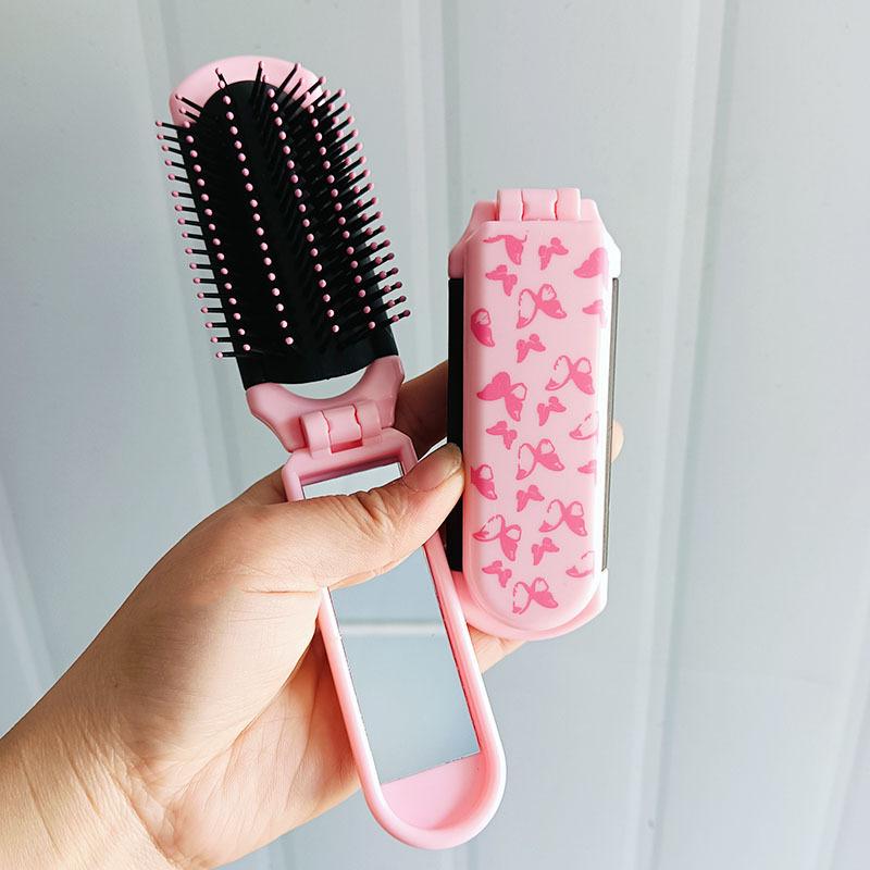 Portable Folding Air Cushion Brush with Mirror in Pink, Pocket-Size Comb for Scalp Massage & Styling