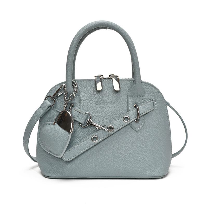 

Niche fashion portable shell bag women s new spring versatile commuter shoulder bag light luxury premium messenger bag синий