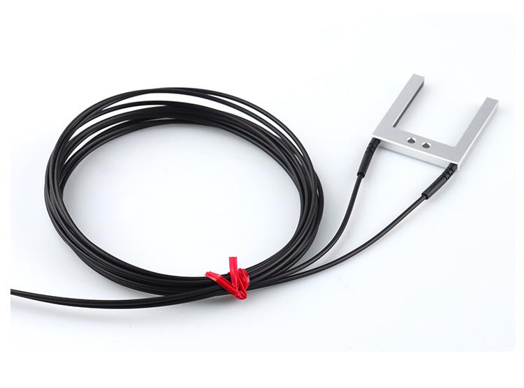 U-groove Through-beam Fiber Optic Sensor for Label Positioning with U-shaped Grating Probe