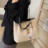Niche Woven Bucket Bag 2025 New Class Commuting Tote Bag for Women Large Capacity Vacation Shoulder Straw Bag