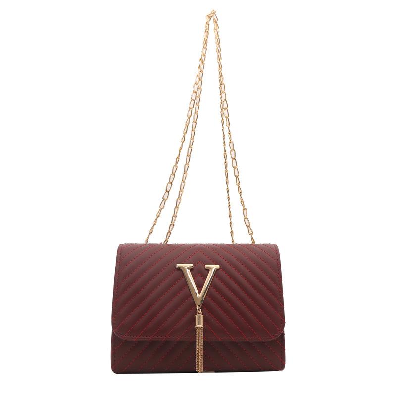 

Trend women s bags 2024 spring new fashion striped embroidered shoulder bag V-shaped fringed decorative messenger bag бордовий