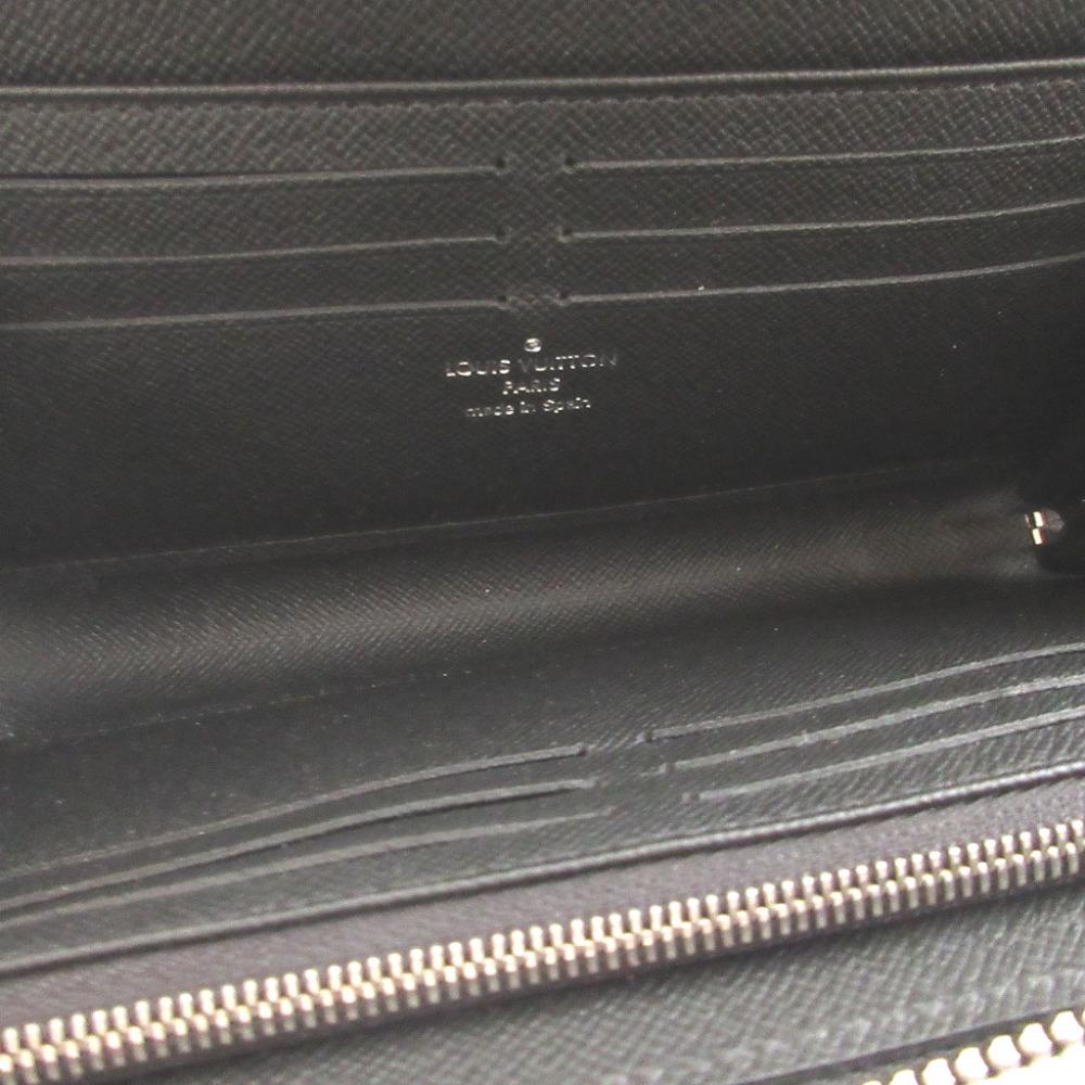Used AUTHENTIC LOUIS VUITTON M69409 L-shaped fastener Taiga Zippy Dragonnes wallet
