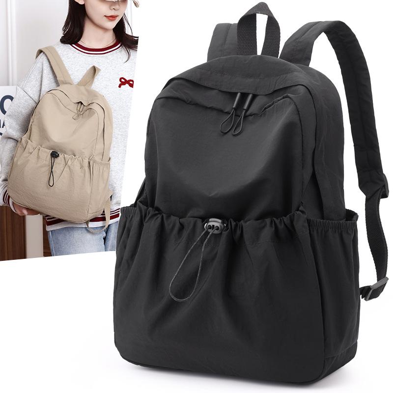 Solid color nylon backpack large capacity casual simple college students men and women with the same versatile lightweight backpack
