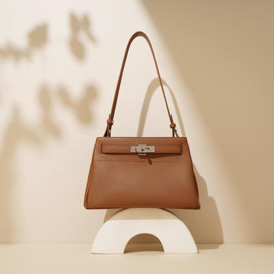 New High-end Fashion Cowhide Lock Armpit Bag Commuter Leather Portable Messenger Bag