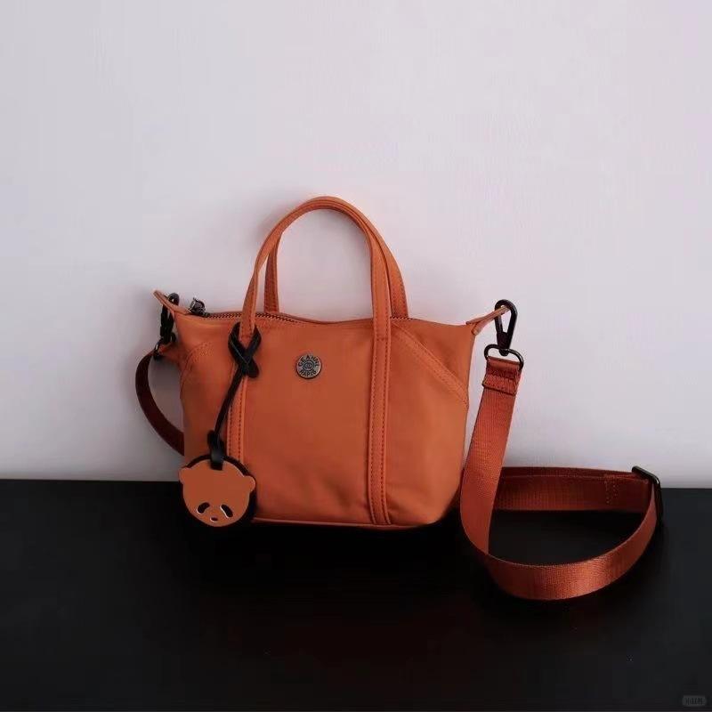 

New niche macaron color mini tote bag Korean version of handbag simple and fashionable one-shoulder crossbody bag for women помаранчевий