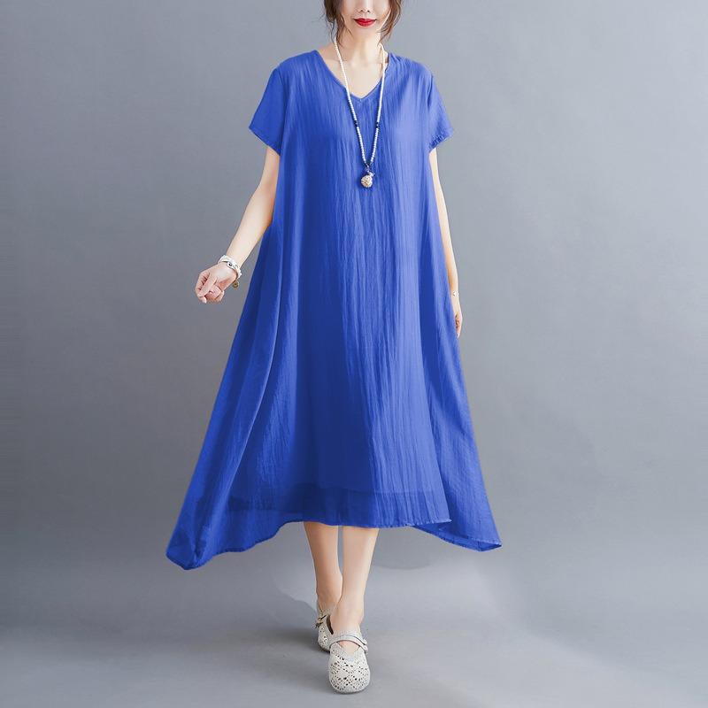 A Woman In A Solid V-neck Dress for Summer