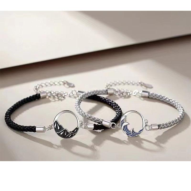 A stylish woven moon pendant bracelet, a couple's jewelry piece suitable for everyday wear by couples.