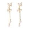 Spring and summer new pearl butterfly earrings female super fairy temperament tassel long stud earrings fairy ears