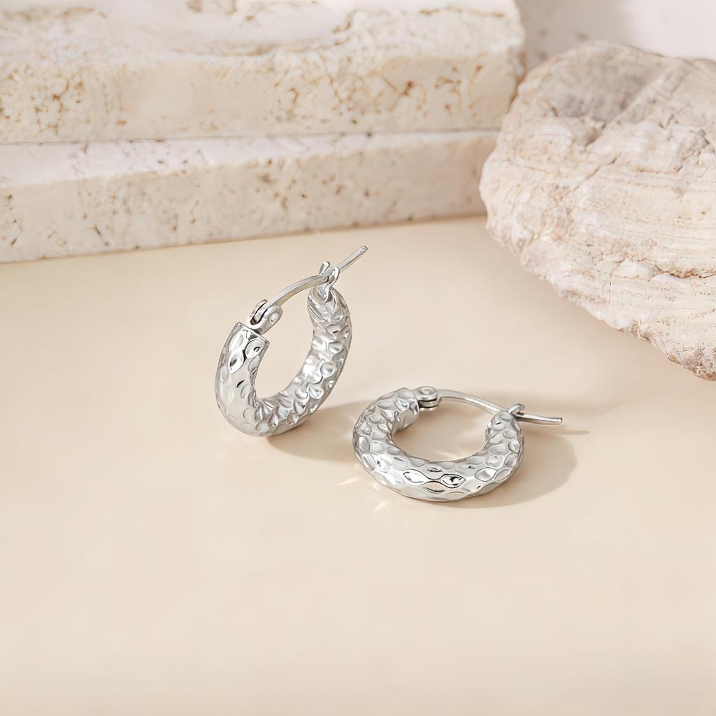 Orecchini a Cerchio Geometrici Intrecciati Europei e Americani in Acciaio al Titanio - Design Elegante e Unico per Donna