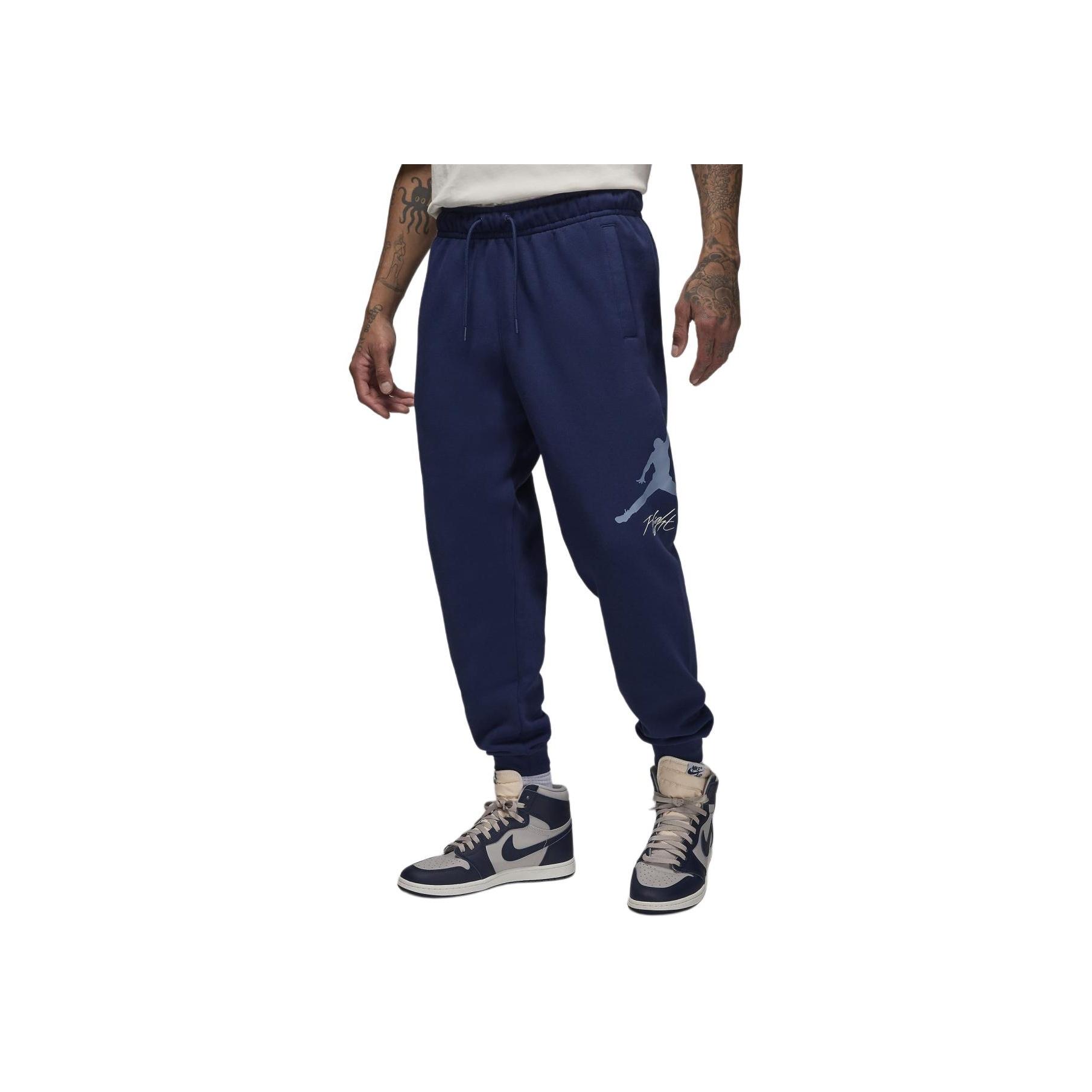 

Чоловічі спортивні штани Jordan Essentials Baseline з принтом логотипу, флісові, на шнурку, з манжетами, в язані, колір опівночі-синій FD7345-410 M